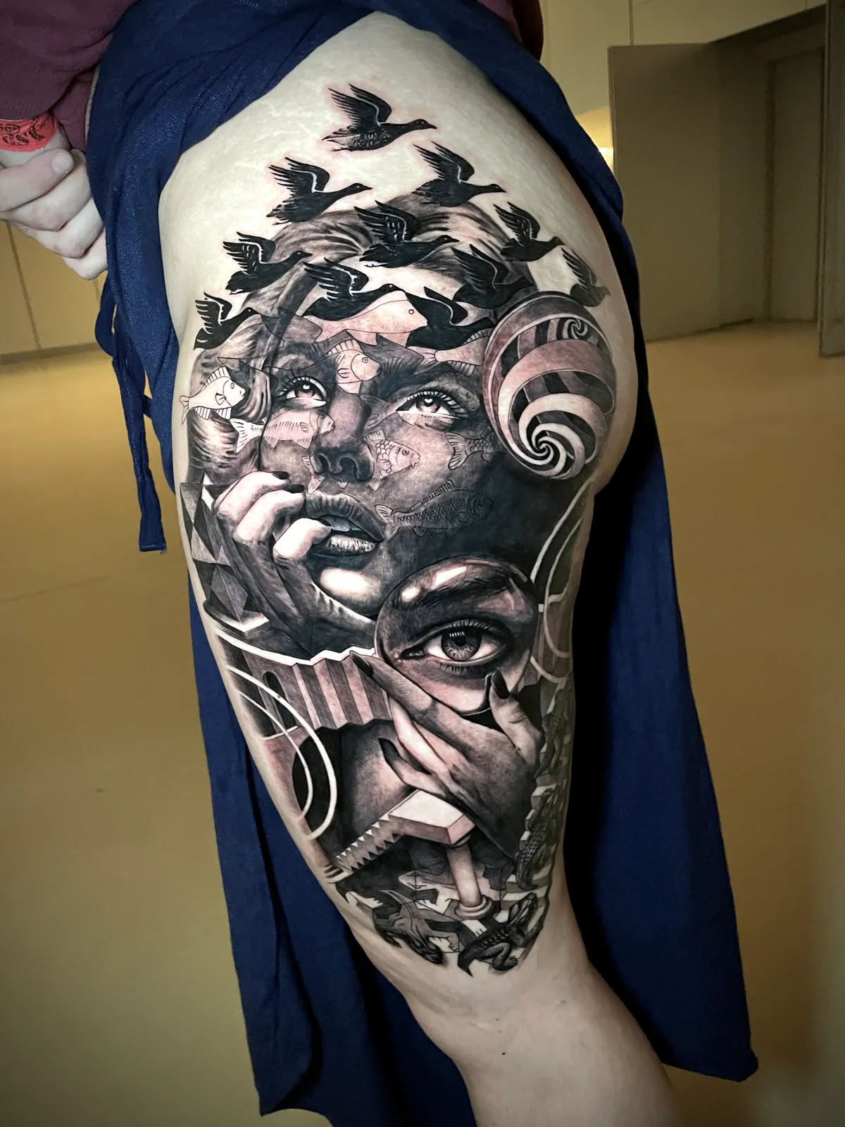 Black and grey surrealism woman portrait with birds and spiral elements large scale tattoo by Andras Tattoo