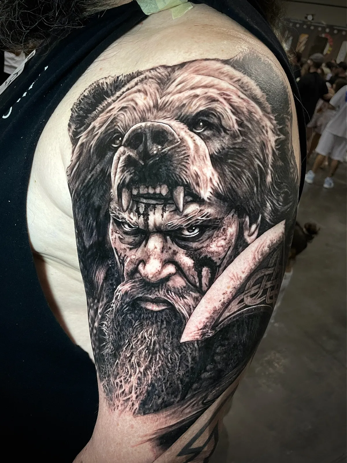 Black and grey realism Berserker Viking warrior with bear headdress tattoo by Paul Michael Andras - Valencia Convention award winner